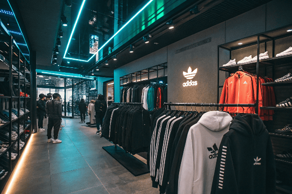 Limited edition Nike and Adidas hoodies displayed on racks