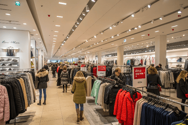 Busy fast fashion retail store with customers