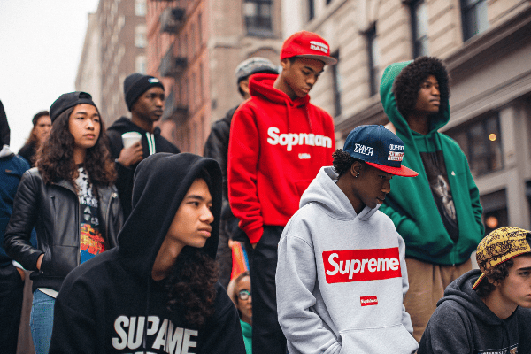 Diverse group wearing Supreme