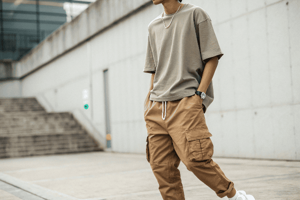 person wearing cargo pants with oversized t-shirt