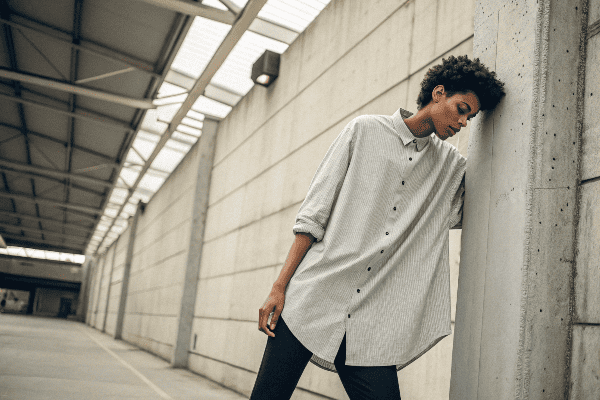 Athletic person in oversized shirt
