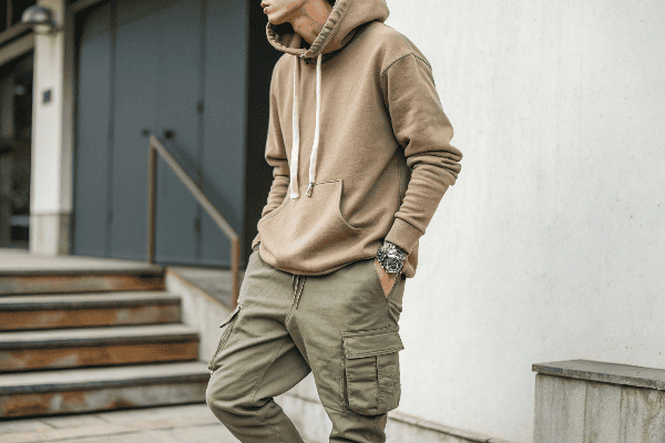 person wearing hoodie with cargo pants
